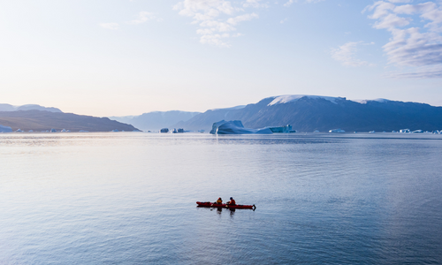 Kayakers in Scoresbysund, East Greenland